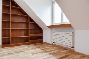 View of empty bookshelf in the attic