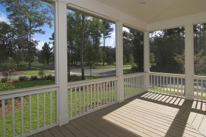 screened-in porch with view of park